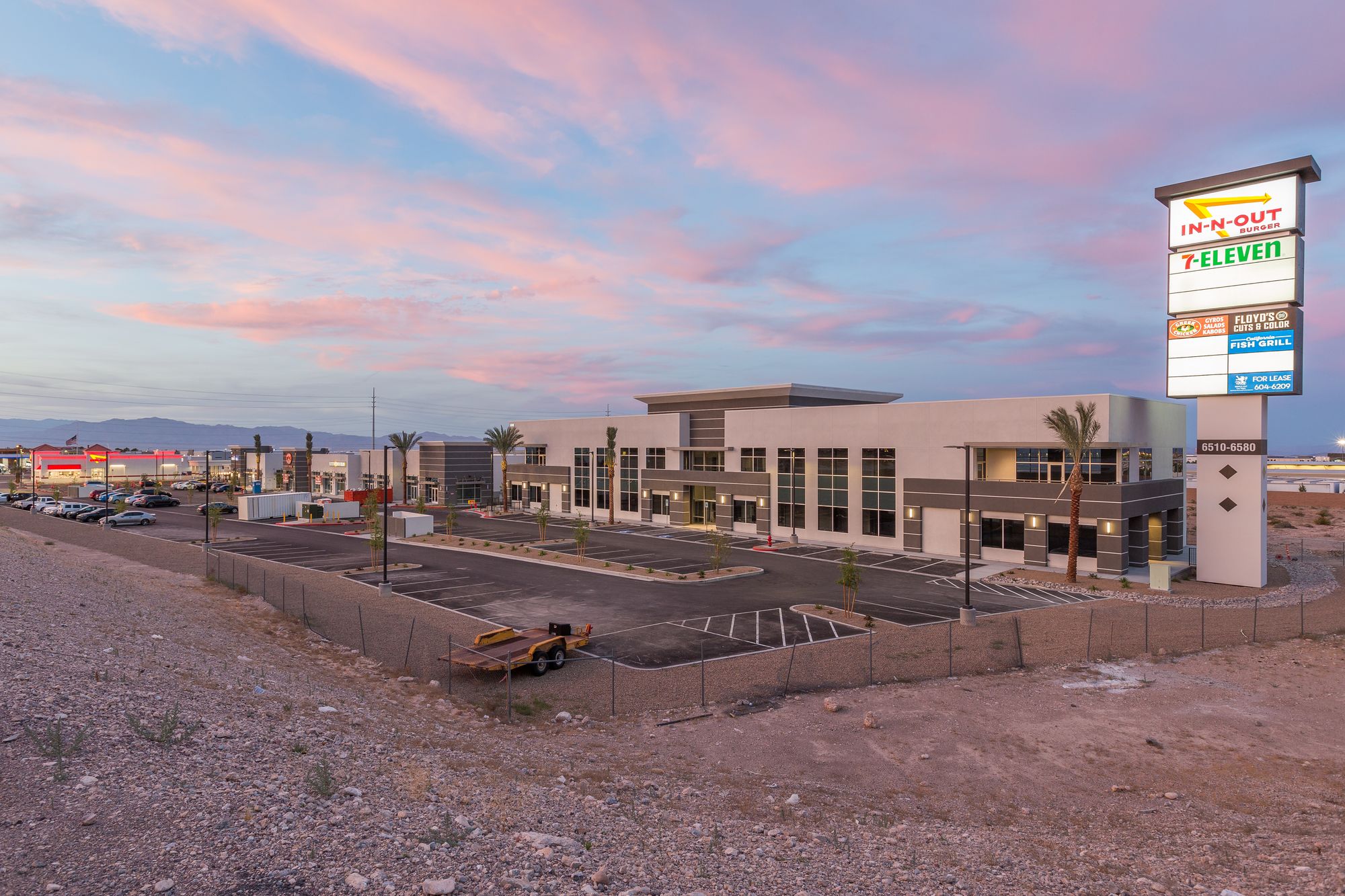 Southern Highlands ground-up retail building at dusk, built by Cardo Construction in Las Vegas