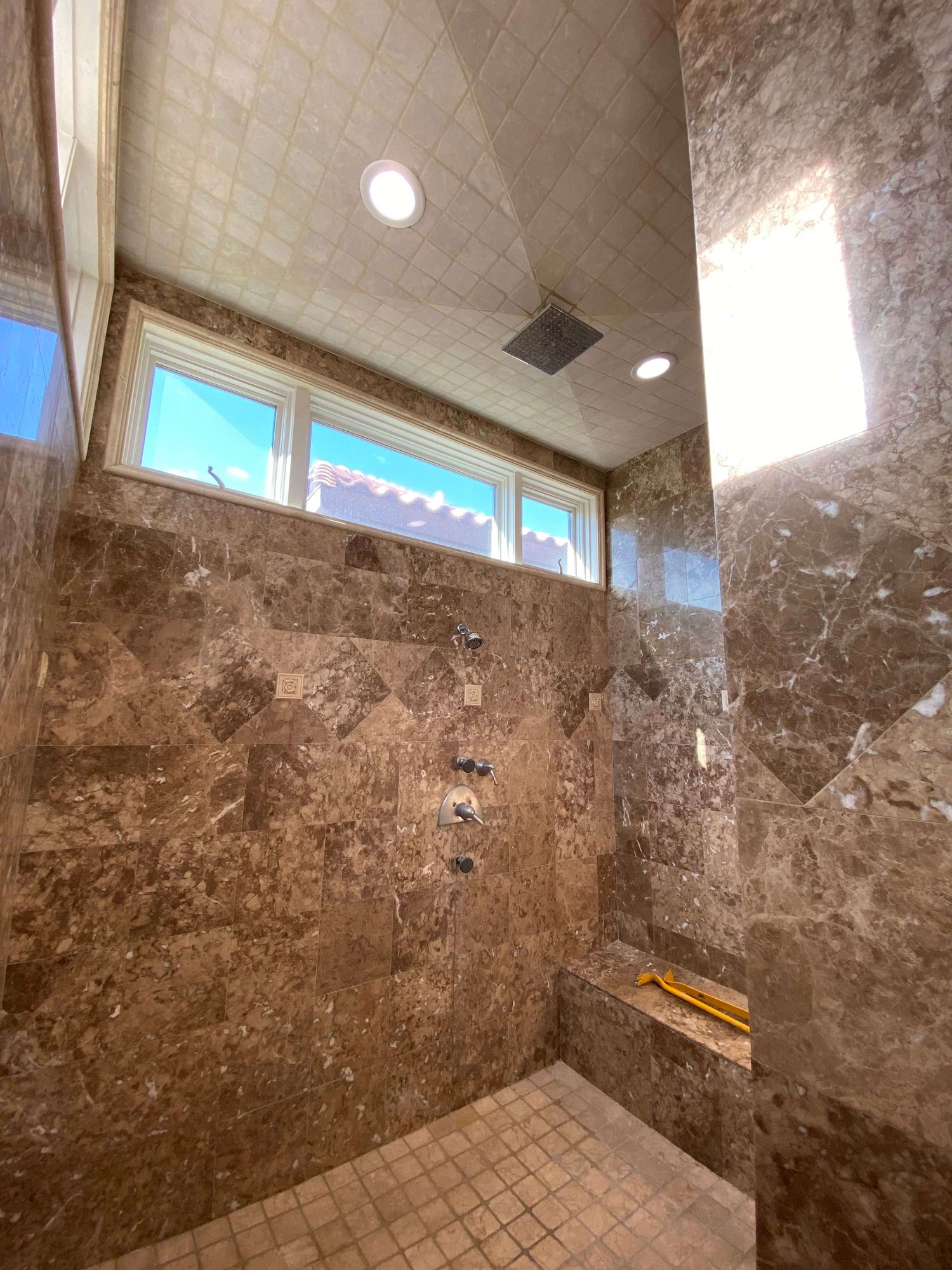 Primary bathroom remodel with walk-in shower by Cardo Construction