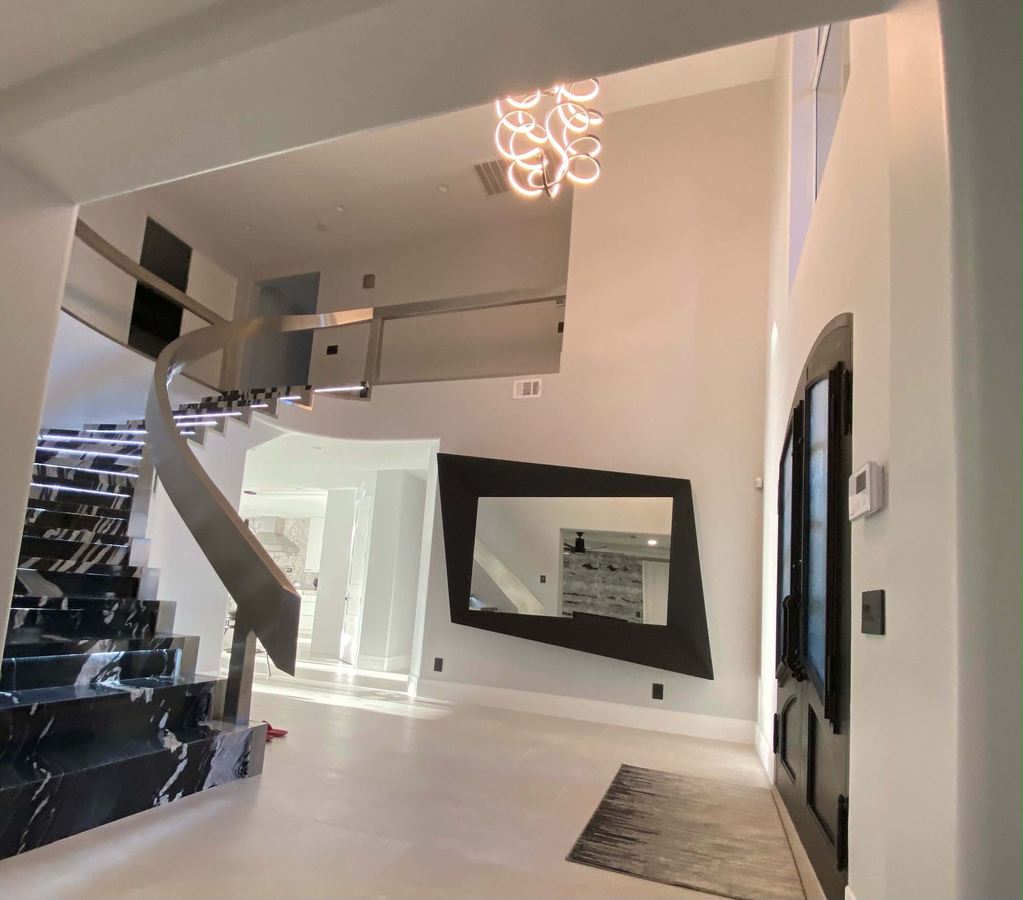 Custom home interior staircase by Cardo Construction